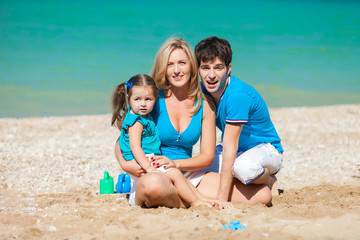 Fototapeta na wymiar Family on beach vacation