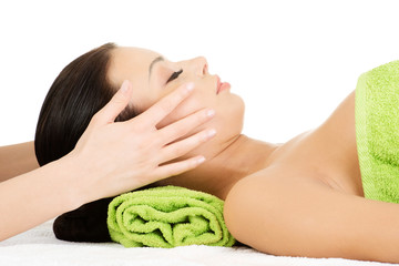 Obraz na płótnie Canvas Beautiful relaxed woman enjoy receiving face massage