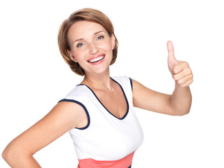 Portrait of a beautiful adult happy woman with thumbs up sign