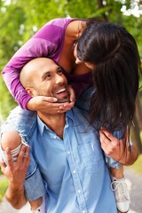 Happy smiling middle-aged couple outdoors