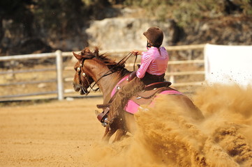 Girl is riding a horse