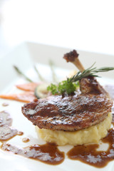 roasted chicken leg with fries potato and herbs