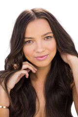 Fototapeta premium Sensual beautiful woman running her hand through her hair