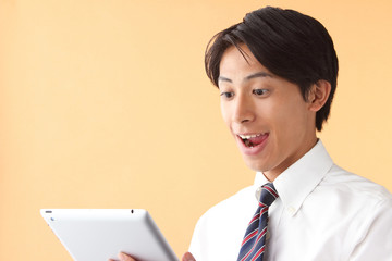 A businessman with touchpad