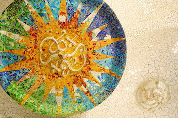 Fototapeta premium Park Guell sun mosaic ceiling in Barcelona