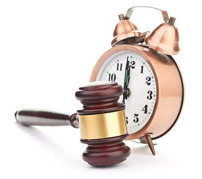 Gavel and old clock