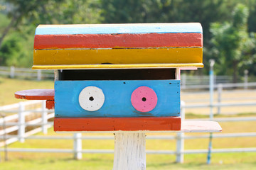 colorful bird house in farm