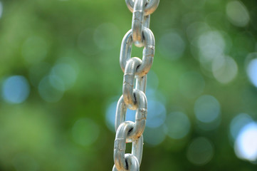Fragment of links of a chain close up