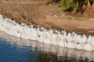 large sandbag flood defences