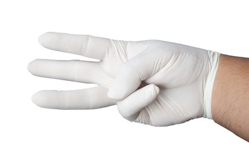 Hand wearing rubber glove