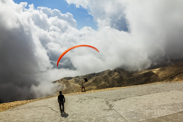 Paraglider flies from Mount Tahtali, Turkey