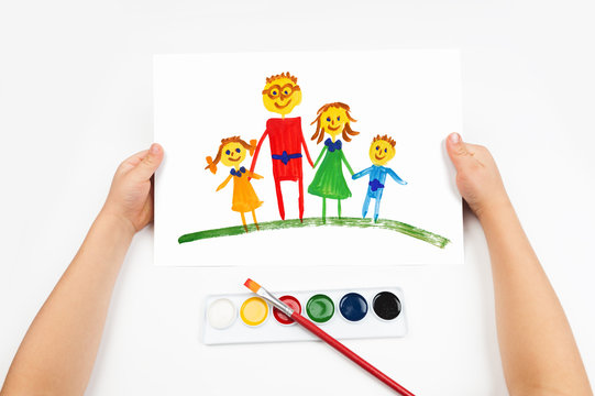 Child draws the family watercolors