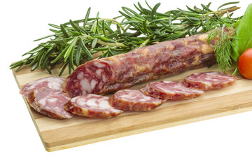 Salami with rosemary, basil and tomato