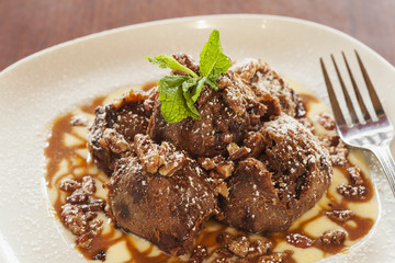 chocolate turtle beignets with creme anglais