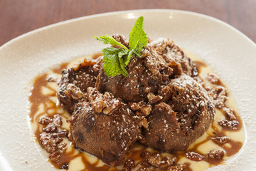 chocolate turtle beignets with creme anglais