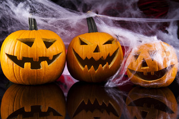 Halloween background with web and spider,pumpkin 