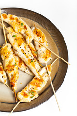 Spicy grilled chicken meat on skewer