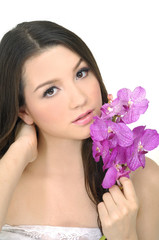 beauty skin care holding bouquet pink orchid