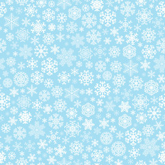 Christmas seamless pattern from snowflakes on blue background