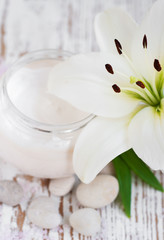 Face cream with lily flowers