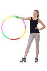 Woman doing exercises with hula hoop