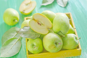 fresh apples in yellow box