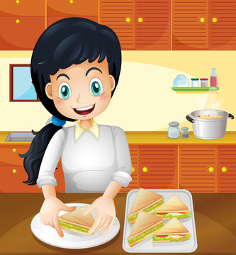 A happy mother preparing snacks in the kitchen