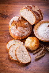 Freshly baked bread on wooden table