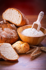 Freshly baked bread on wooden table