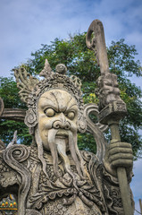 Fototapeta premium Chinese stone statue in Wat Pho, Bangkok, Thailand.Chinese stone