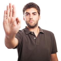 man doing stop gesture on a white background