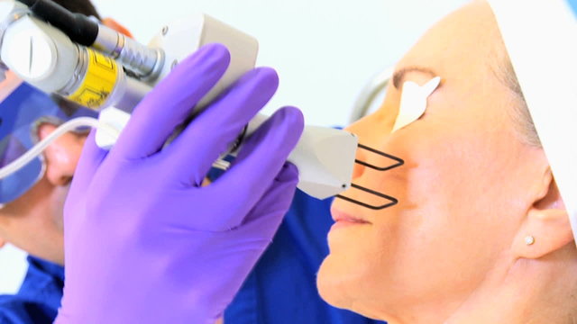 Senior Caucasian Female Cosmetic Surgeon Close Up