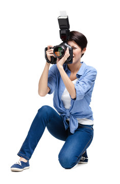 Woman-photographer takes images, isolated 