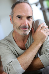 Obraz premium Portrait of handsome mature man at home