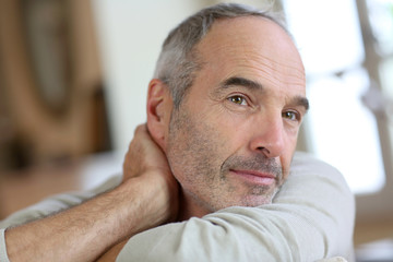 Fototapeta premium Closeup of relaxed and serene senior man
