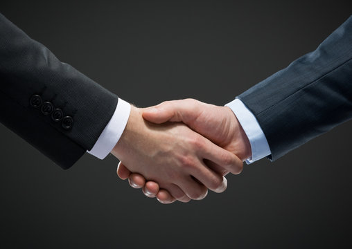 Close up view of handshake of business people