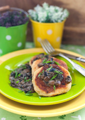 Potato pancakes with mushroom sauce