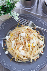 Linguine with cheese, pine nuts and citrus zest