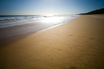 sunrise at the beach with sun in the frame....