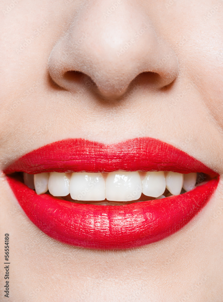 Wall mural close up of female smiling red lips