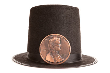 Abraham Lincoln hat and commemorative penny