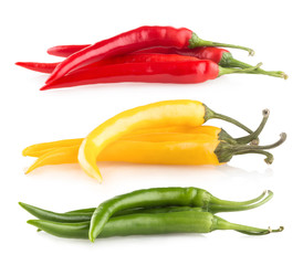 colorful chili peppers isolated on white background