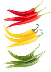colorful chili peppers isolated on white background
