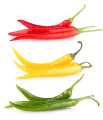 colorful chili peppers isolated on white background