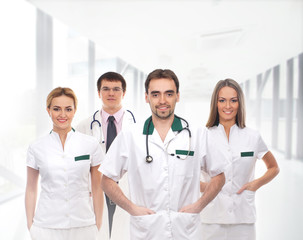 Fototapeta premium A team of doctors standing in white clothes in the hospital