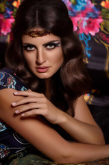 Fototapeta premium Portrait of beautiful young woman with makeup