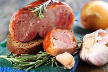 Home sausage,rye bread, garlic and rosemary.