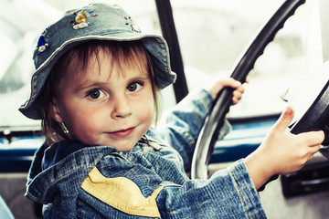 Driving little kid