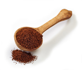 wooden scoop with ground coffee