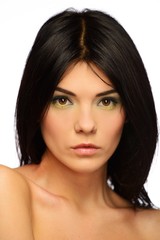 Fototapeta premium Young beautiful brunette woman with make-up